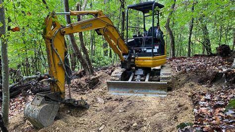 skid steer trail building|mini excavator trail building.